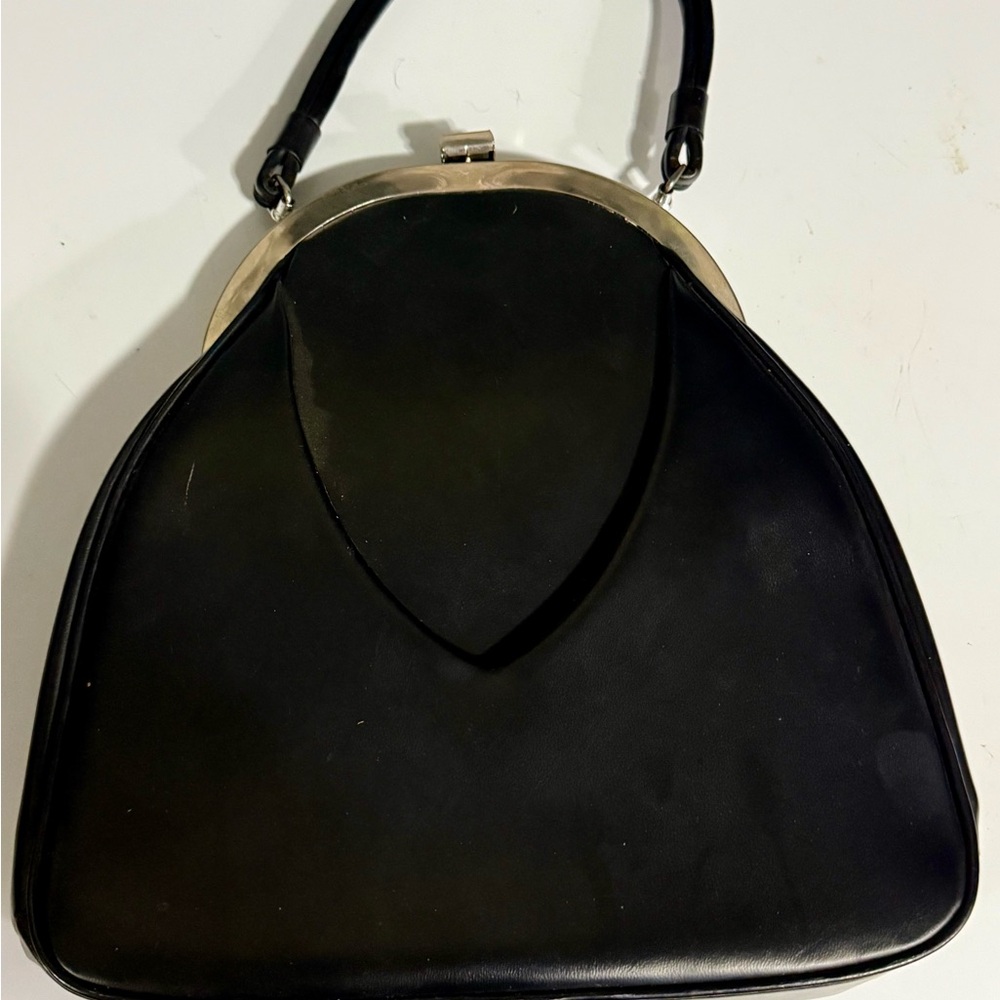 Vintage Garay Handbag with gold colored hardware, possibly panted leather.